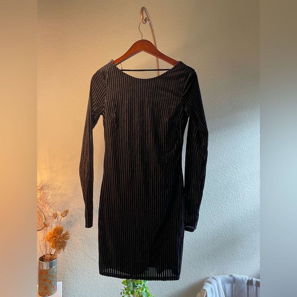 Black pinstripe felt dress.